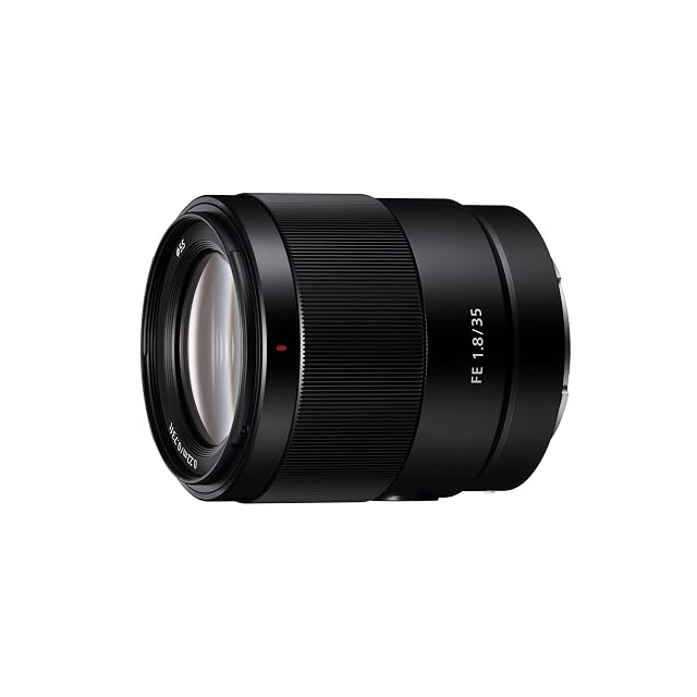Objetivo normal angular Sony SEL35F18F negro con su botón de bloqueo de enfoque y su selector de modo